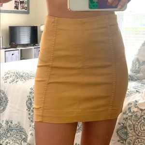Yellow mini skirt
